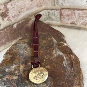 Brahmin Gold Medallion Plum or Wine Color